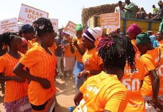 Kayayei performing at the market