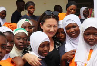 Norwegian Ambassador to Ghana, Her Excellency Ingrid Mollestad and some school girls in Pusiga.