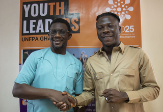 Stonebwoy and UNFPA Representative Niyi Ojuolape.   