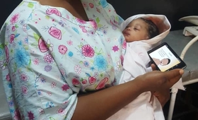 Ms. Fareeda Yelgie a midwife from Tulon after assisting the delivering  a baby with the help of the Safe Delivery App