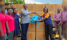 Handing over of the dignity kits on behalf of UNFPA by the Deputy Country Representative, Emmily Naphambo, Ph.D