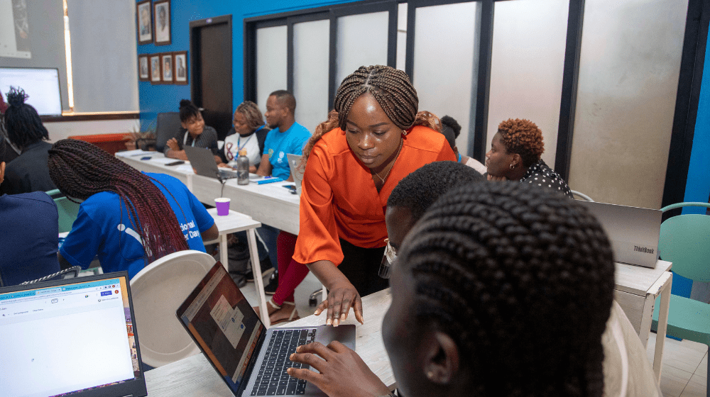 A facilitator taking some of the participants through some modules and information sessions during the youth consultations as pa