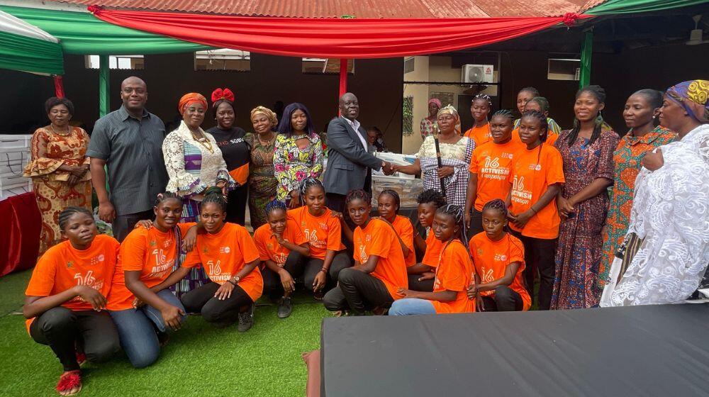 UNFPA Country Representative, Dr. Wilfred Ochan presenting items to the adolescent girls of the Nana Afrakoma Vocational Centre